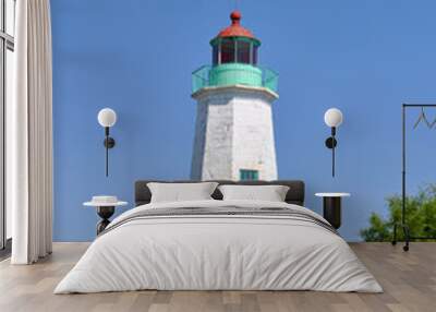 Old Point Comfort Lighthouse and keeper`s quarters in Fort Monroe, Chesapeake Bay, Virginia, USA. Wall mural